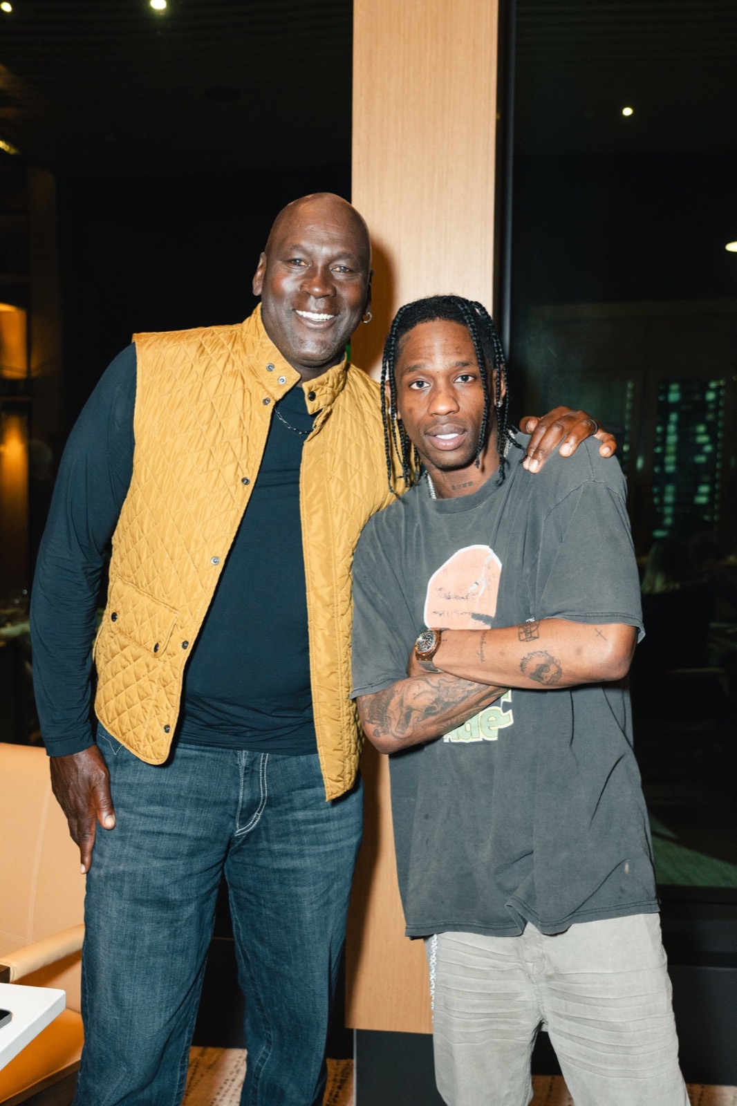 Two guests posing at an evening event